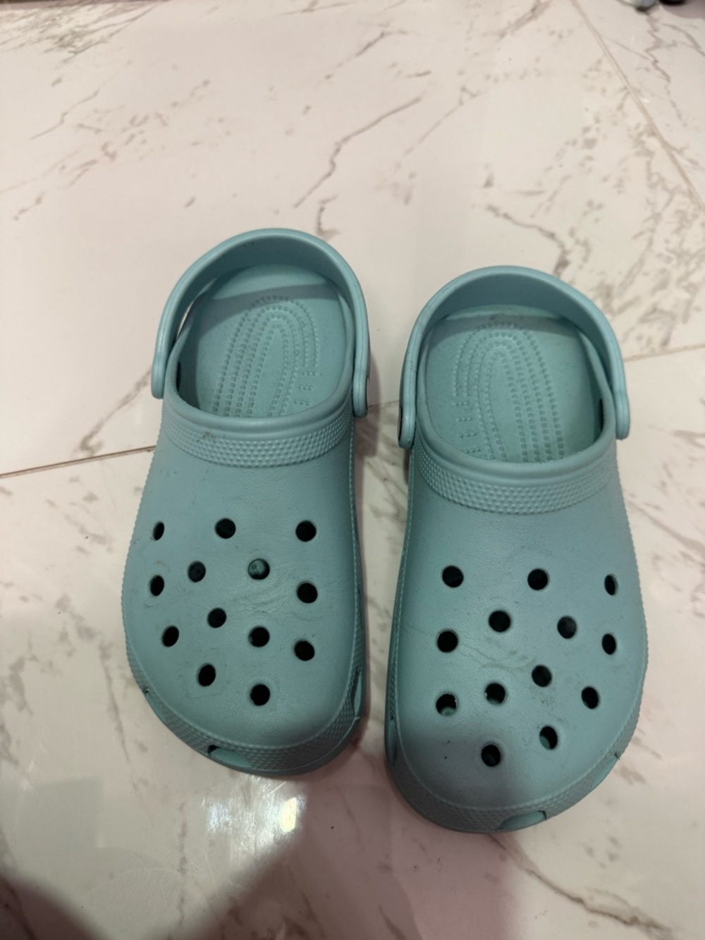 CROCS Classic Slip-On Clogs in Light Blue